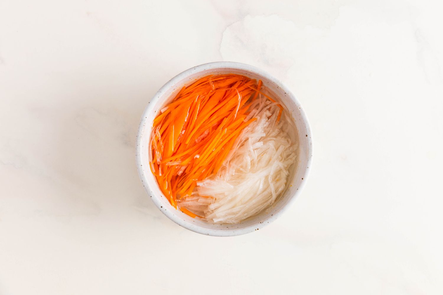 Bowl of do chua ingredients for banh mi salad recipe