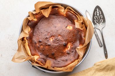 Basque cheesecake in cake pan.